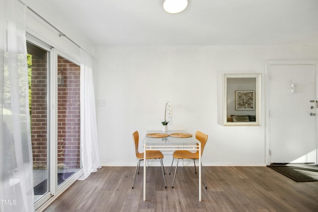 1208 Manassas Ct Unit A, Raleigh, NC 27609 - dining area with wood finished floors and baseboards