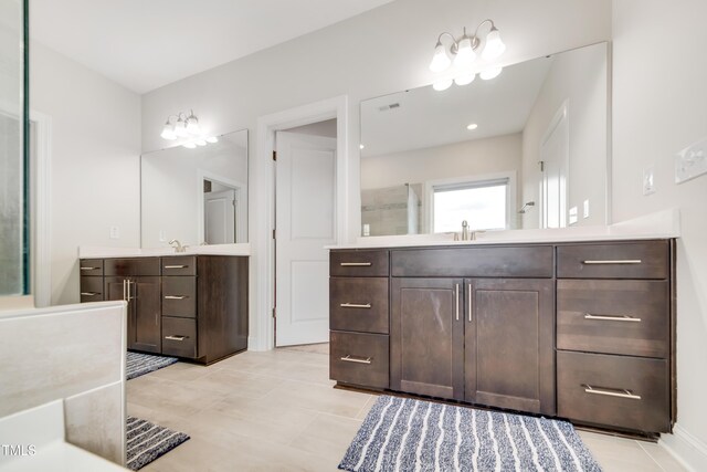 5420 Mill Dam Rd, Wake Forest, NC 27587 - bathroom with two vanities and tile patterned floors
