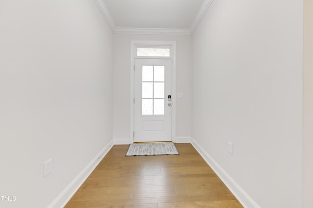 5420 Mill Dam Rd, Wake Forest, NC 27587 - doorway to outside featuring ornamental molding, light wood-type flooring, and baseboards