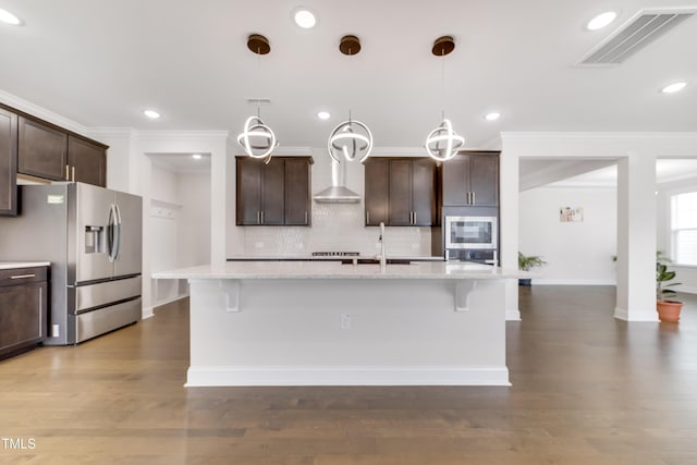 5420 Mill Dam Rd, Wake Forest, NC 27587 - kitchen with stainless steel fridge with ice dispenser, built in microwave, crown molding, tasteful backsplash, and dark brown cabinets