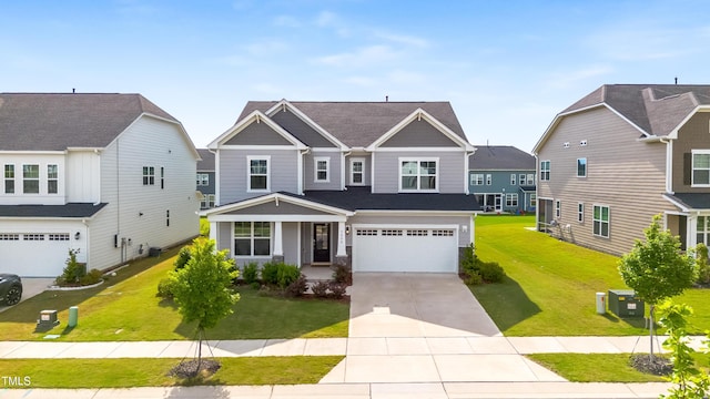 5420 Mill Dam Rd, Wake Forest, NC 27587 - craftsman house featuring a garage, concrete driveway, a front lawn, and a residential view