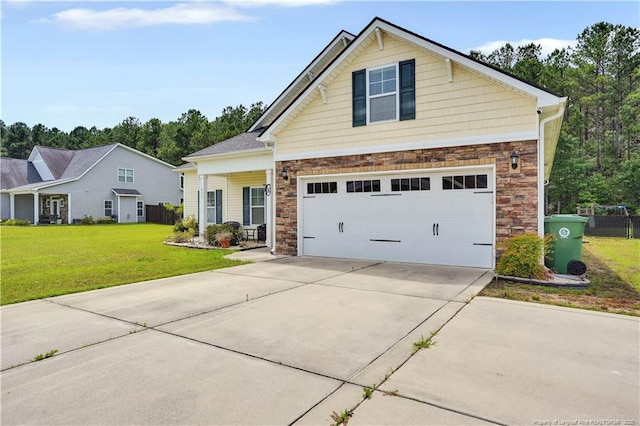 213 Windwood Dr, Stedman, NC 28391 - craftsman-style home featuring stone siding and concrete driveway