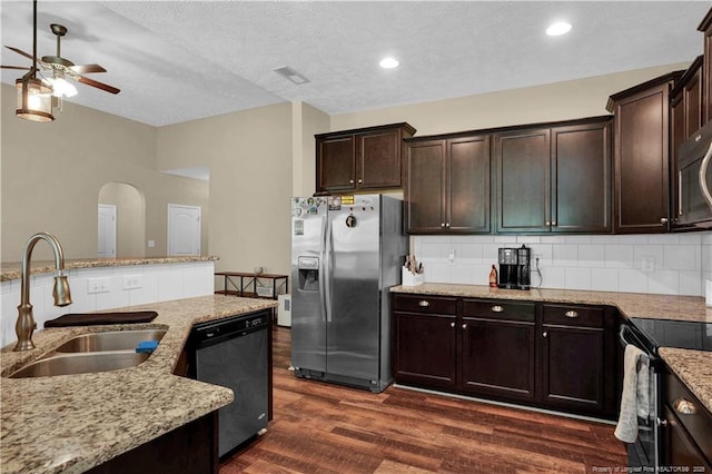 213 Windwood Dr, Stedman, NC 28391 - kitchen with stainless steel refrigerator with ice dispenser, dishwasher, black electric range, a sink, and a ceiling fan