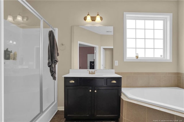 213 Windwood Dr, Stedman, NC 28391 - full bath featuring a stall shower, a bath, vanity, and tile patterned floors