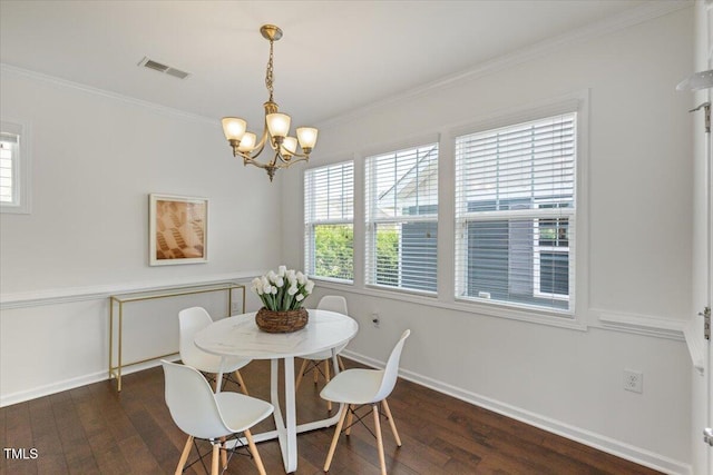 2837 Milano Ave, Apex, NC 27502 - dining room with wood finished floors, a chandelier, crown molding, and baseboards