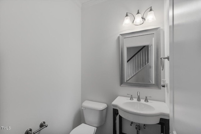 2837 Milano Ave, Apex, NC 27502 - bathroom featuring toilet and crown molding