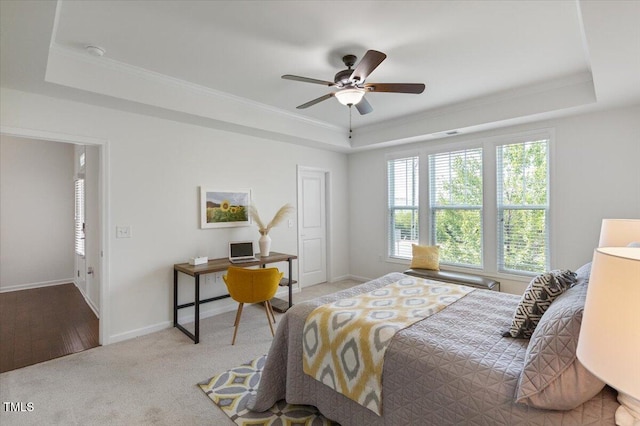 2837 Milano Ave, Apex, NC 27502 - bedroom featuring a tray ceiling, ornamental molding, baseboards, carpet flooring, and ceiling fan