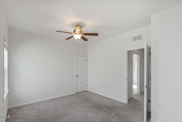 2837 Milano Ave, Apex, NC 27502 - unfurnished bedroom with carpet flooring, baseboards, and ceiling fan