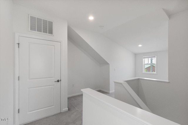 2837 Milano Ave, Apex, NC 27502 - corridor featuring an upstairs landing, light colored carpet, recessed lighting, baseboards, and vaulted ceiling