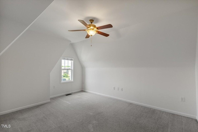2837 Milano Ave, Apex, NC 27502 - additional living space with carpet floors, a ceiling fan, baseboards, and vaulted ceiling