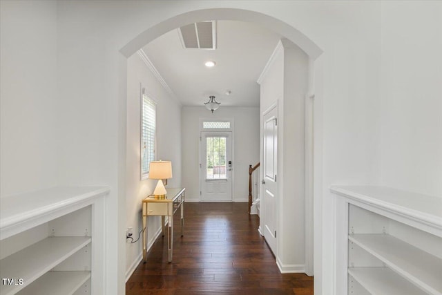 2837 Milano Ave, Apex, NC 27502 - foyer entrance with wood-type flooring, arched walkways, baseboards, ornamental molding, and recessed lighting