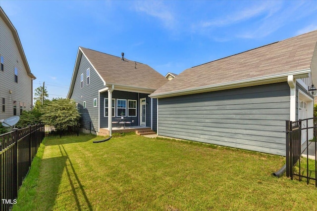 2837 Milano Ave, Apex, NC 27502 - rear view of house featuring a shingled roof and a patio
