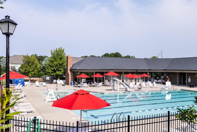 2837 Milano Ave, Apex, NC 27502 - community pool with a patio area and a water slide