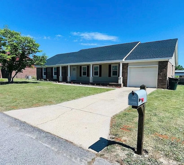 7690 Beverly Dr, Fayetteville, NC 28314 - ranch-style house with a garage, concrete driveway, a front yard, and a shingled roof
