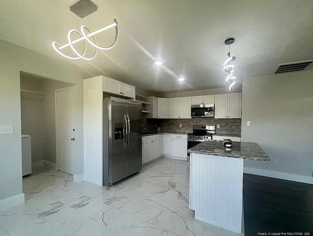 7690 Beverly Dr, Fayetteville, NC 28314 - kitchen featuring stainless steel appliances, light marble finish floors, baseboards, and recessed lighting