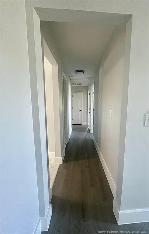 7690 Beverly Dr, Fayetteville, NC 28314 - hallway featuring wood finished floors and baseboards