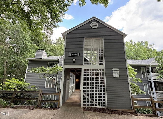 4120 Sedgewood Dr Unit 106, Raleigh, NC 27612 - view of front facade with a chimney