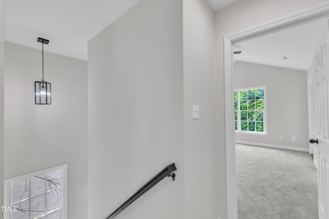 2204 Bellaire Ave, Raleigh, NC 27608 - corridor featuring carpet flooring, an upstairs landing, baseboards, and lofted ceiling