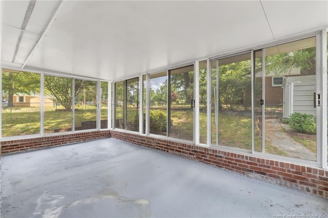 unfurnished sunroom with plenty of natural light