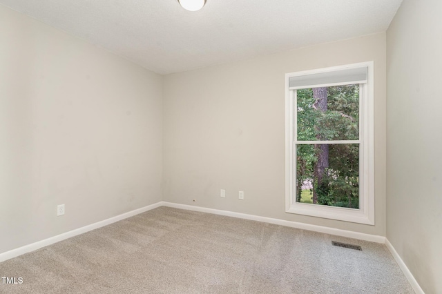 1304 Seaton Rd Unit 1, Durham, NC 27713 - empty room featuring carpet and baseboards