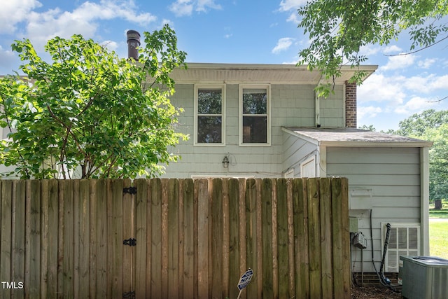 1304 Seaton Rd Unit 1, Durham, NC 27713 - view of home's exterior with cooling unit