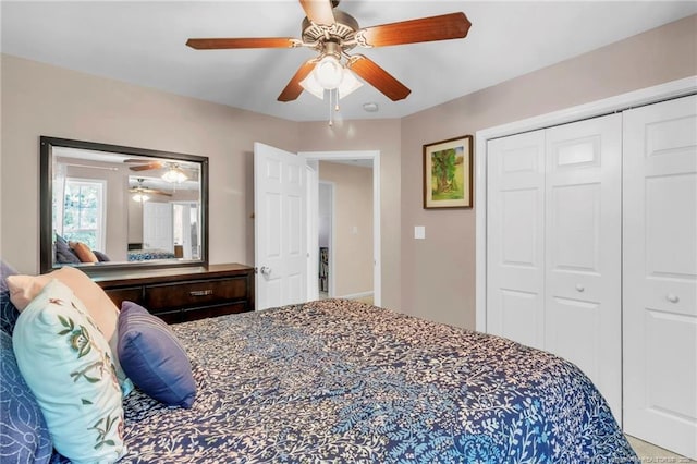 bedroom featuring a closet and a ceiling fan