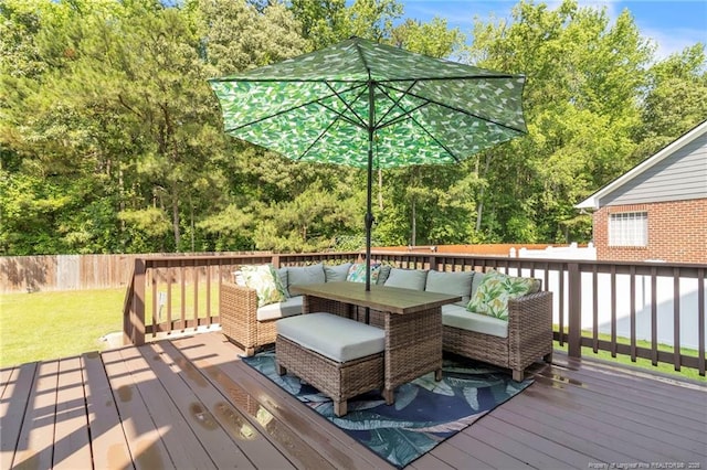 wooden terrace featuring an outdoor hangout area