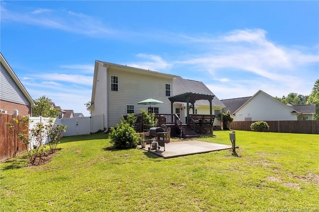 back of house featuring a pergola and a patio area