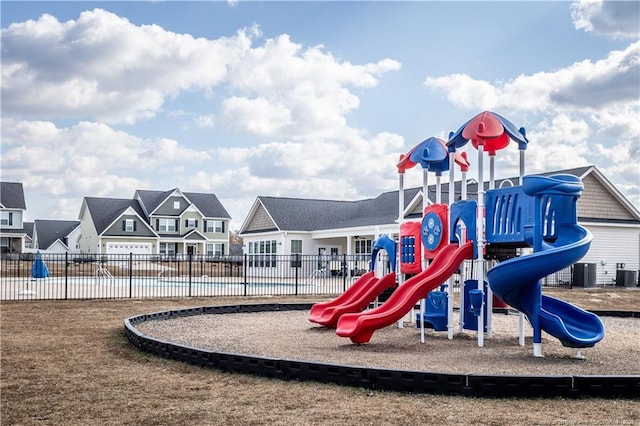 communal playground featuring central AC and a residential view