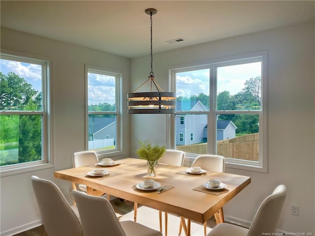 dining room featuring baseboards