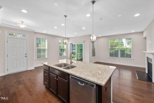 1103 Laurel Twist Rd, Cary, NC 27513 - kitchen featuring stainless steel dishwasher, a sink, baseboards, dark wood finished floors, and healthy amount of natural light