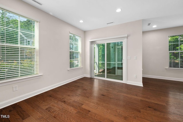 1103 Laurel Twist Rd, Cary, NC 27513 - empty room with wood finished floors, baseboards, healthy amount of natural light, and recessed lighting