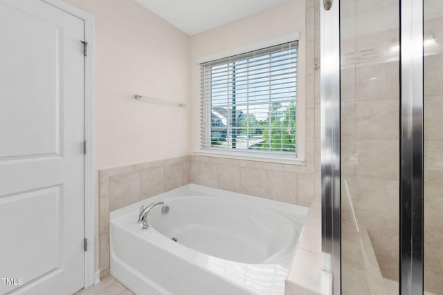 1103 Laurel Twist Rd, Cary, NC 27513 - bathroom featuring a garden tub and a shower with door