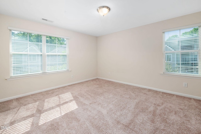 1103 Laurel Twist Rd, Cary, NC 27513 - carpeted empty room with healthy amount of natural light and baseboards