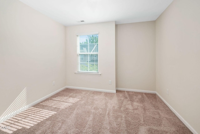 1103 Laurel Twist Rd, Cary, NC 27513 - unfurnished room featuring light carpet and baseboards