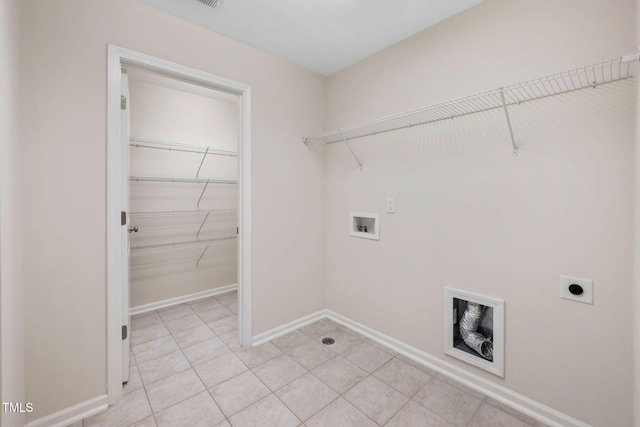 1103 Laurel Twist Rd, Cary, NC 27513 - washroom with washer hookup, electric dryer hookup, baseboards, and light tile patterned floors