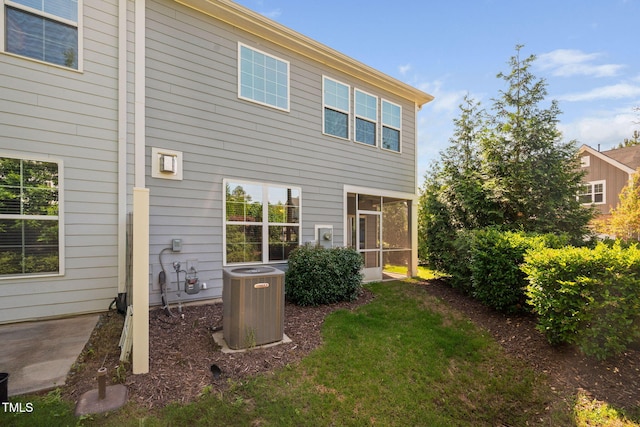 1103 Laurel Twist Rd, Cary, NC 27513 - back of house with central AC unit and a sunroom