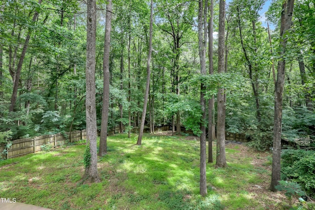 123 W Camden Forest Dr, Cary, NC 27518 - view of yard featuring a forest view