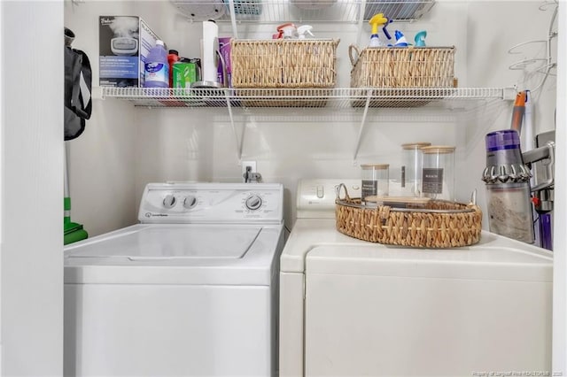laundry room featuring washing machine and dryer