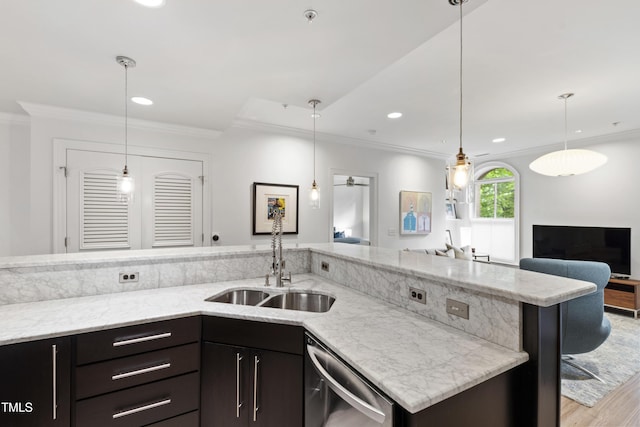 710 Independence Pl Unit 103, Raleigh, NC 27603 - kitchen featuring stainless steel dishwasher, a sink, crown molding, light wood finished floors, and open floor plan