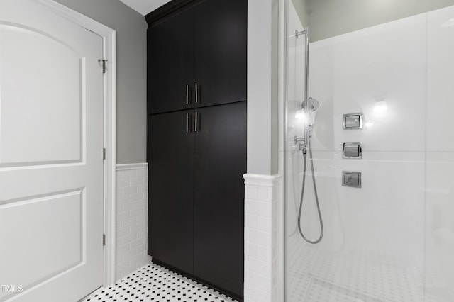 710 Independence Pl Unit 103, Raleigh, NC 27603 - bathroom with walk in shower and a wainscoted wall