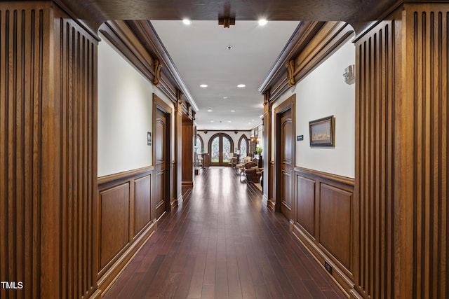 710 Independence Pl Unit 103, Raleigh, NC 27603 - hallway featuring a wainscoted wall, dark wood finished floors, recessed lighting, and a barn door