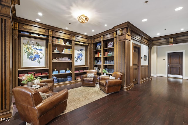 710 Independence Pl Unit 103, Raleigh, NC 27603 - living area featuring crown molding, dark wood-style floors, recessed lighting, baseboards, and arched walkways