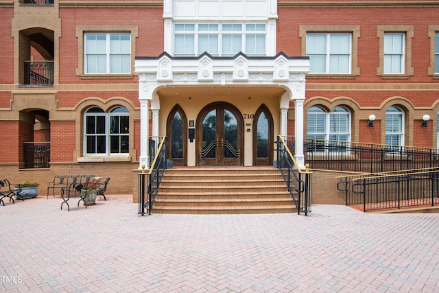 710 Independence Pl Unit 103, Raleigh, NC 27603 - property entrance with brick siding and french doors