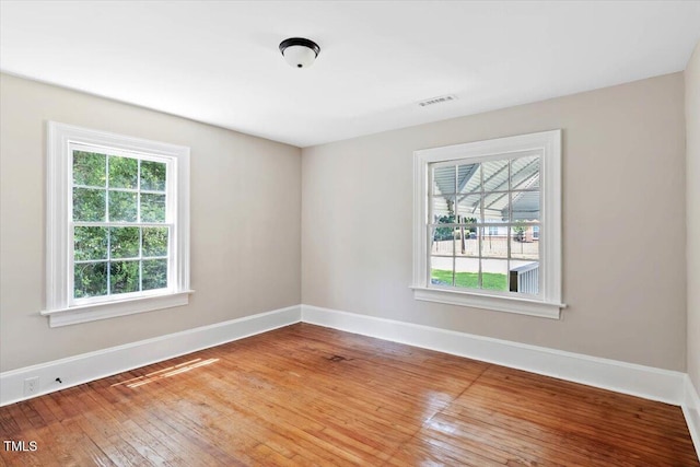 201 Van St, Pinetops, NC 27864 - unfurnished room featuring baseboards and hardwood / wood-style floors