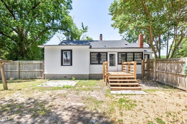 201 Van St, Pinetops, NC 27864 - rear view of property with a fenced backyard, a deck, a chimney, and crawl space