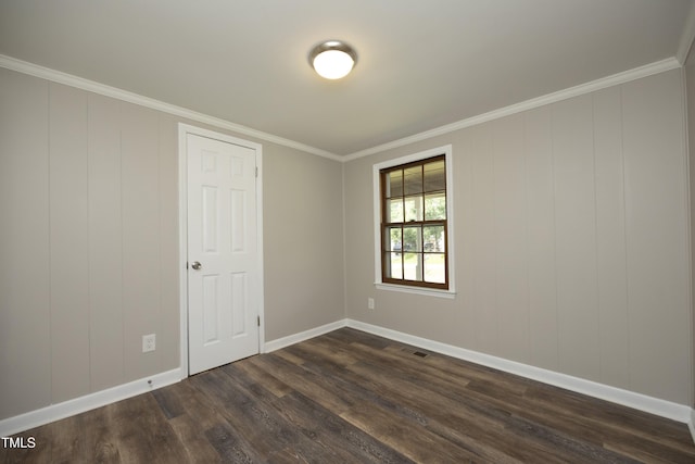 107 Rencher St, Hillsborough, NC 27278 - spare room featuring dark wood-type flooring, baseboards, and ornamental molding