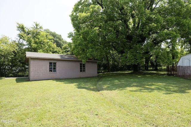 107 Rencher St, Hillsborough, NC 27278 - view of grassy yard with an outbuilding