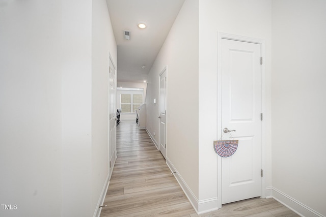 113 Blandford St, Franklinton, NC 27525 - hallway with baseboards, light wood-type flooring, and recessed lighting