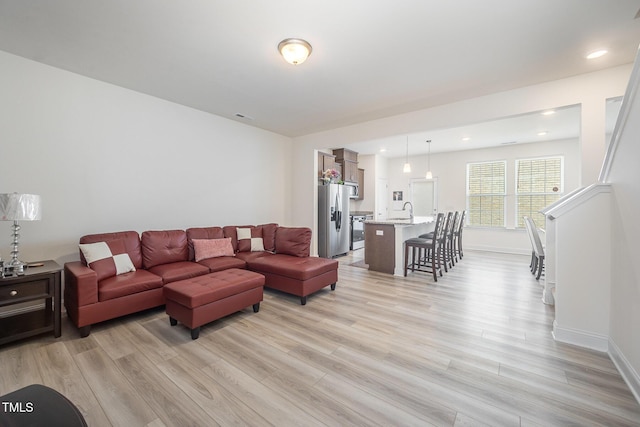 113 Blandford St, Franklinton, NC 27525 - living area featuring light wood-type flooring and baseboards